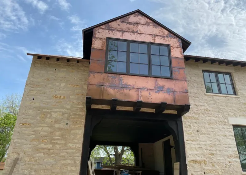 Copper metal panel facade on a stone building for Metal Roof Coating in Rittman